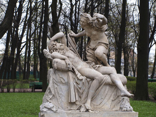 Marble statue of amour and psyche sculpture at Letniy sad park in Saint-Petersburg, Russia