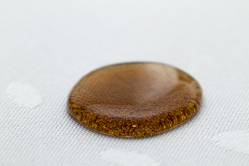 Waterproof coating background with coke drops