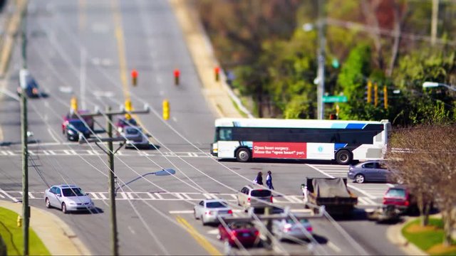 tilt shift timelapse of city intersection