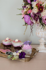 Wedding decorations. Bouquets of flowers and cake