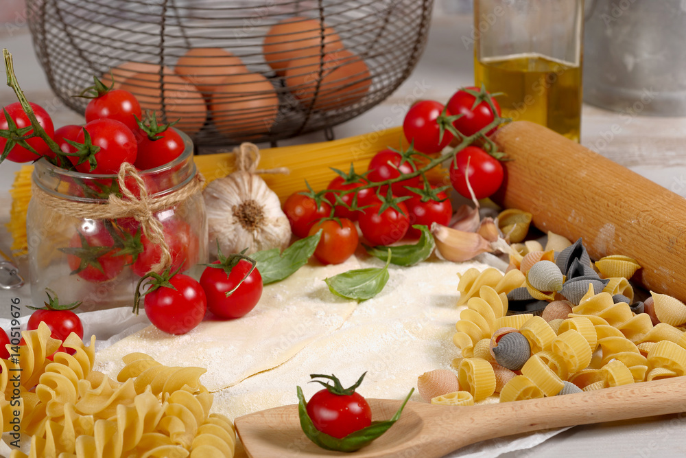 Wall mural pastas with eggs and cherry tomatoes