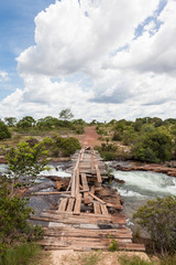 Fototapeta na wymiar Broken Bridge over Balsas River - Fumaca's Waterfall - Jalapao - Brazil