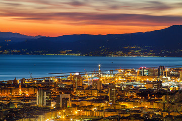 GENOA (GENOVA), ITALY, MARCH  10, 2017 - Aerial view of the city of Genoa (Genova) at dusk.