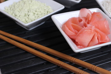 preparing sushi, making sushi, preparing japanese food, making japanese food, ginger, red ginger, sesame, black sesame, chopsticks, wasabi, rice, special rice, special rice for sushi, surimi, 