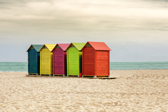 Colorful beach huts or changing rooms in Mediterranean beach