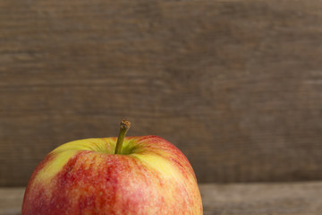 Apple on wooden background