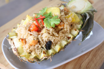 Baked rice with pineapple served in a pineapple