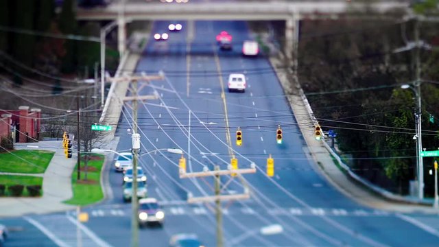 tilt shift timelapse of city intersection