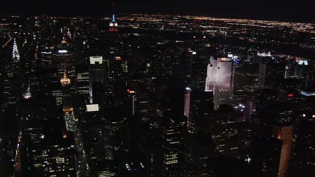 Night flight over Manhattan toward Empire State Building. Shot in 2005.