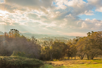 Sunlight Shinning Through the Clouds