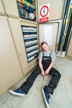 electrician lying on the ground
