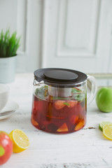 Fresh fruit tea mint apples orange