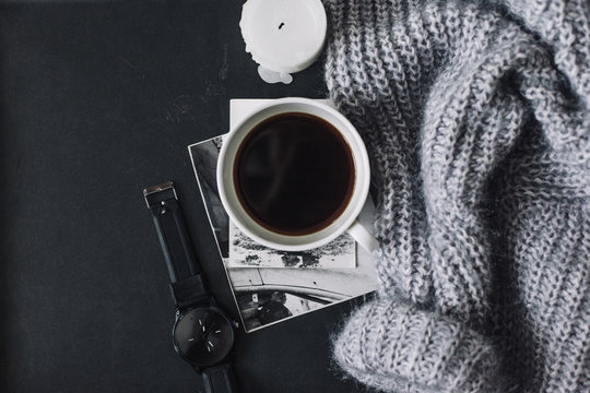 Flatlay of winter sweater and coffee