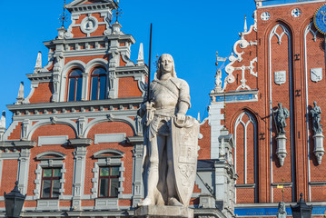 Roland monument and famous landmark building called House of Blackheads on background, Old City of...