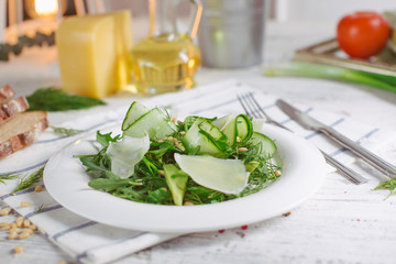 vegetarian Green salad with Parmesan arugula avocado nuts