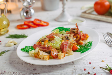 Salad with bacon mushrooms greens and cherry