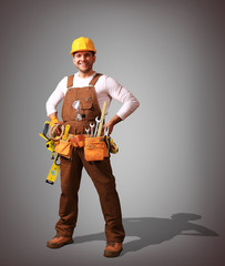 Builder in yellow helmet, protective glasses and working clothes
