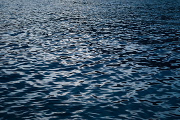 Water surface. Ripples on water. Sea background.