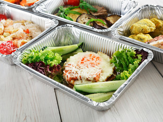 Healthy food in boxes, diet concept.