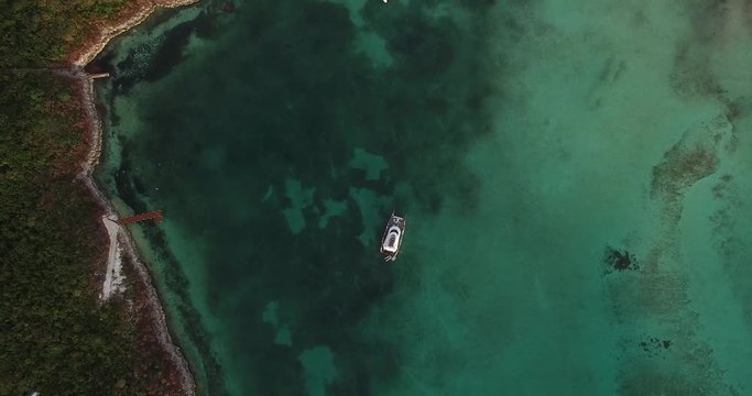 Top View of Yacht on a Coral Reef in Bahamas