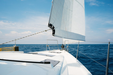 Obraz premium Beautiful yacht in open sea. Traveling, yachting, sailing concept.