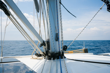 Fototapeta na wymiar Beautiful yacht in open sea. Traveling, yachting, sailing concept.