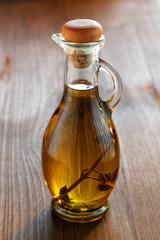 olive oil bottle on a rustic table