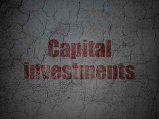 Currency concept: Capital Investments on grunge wall background