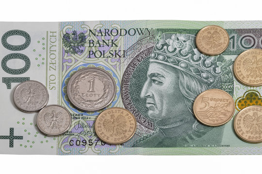 Polish one hundred zloty bill and coins macro isolated