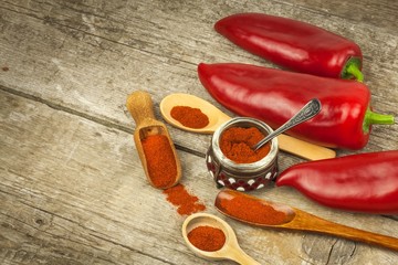 Dried red pepper. Traditional spices. Kitchen table with dried and fresh pepper. Seasoning food.