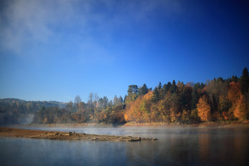 Naklejka na ściany i meble Solina Lake, headland in autumn colors
