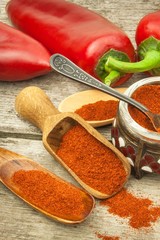 Dried red pepper. Traditional spices. Kitchen table with dried and fresh pepper. Seasoning food.