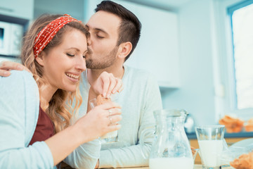 Happy couple in kitchen