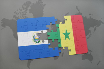 puzzle with the national flag of el salvador and kuwait on a world map