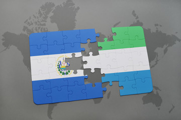 puzzle with the national flag of el salvador and kuwait on a world map