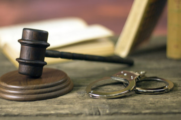Law theme Judge's mallet and Handcuffs