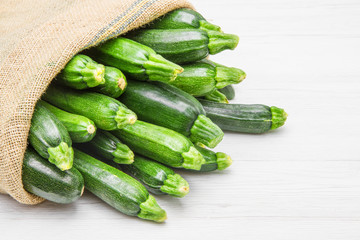 canvas sack full of zucchini
