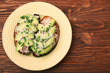 Open avocado sandwiches with tuna on whole grain bread