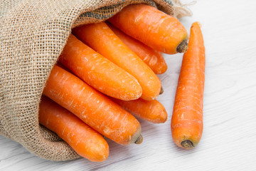 canvas sack full of carrot