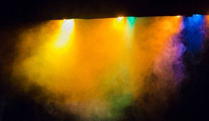 scene, stage light with colored spotlights and smoke