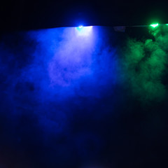 scene, stage light with colored spotlights and smoke