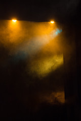 scene, stage light with colored spotlights and smoke