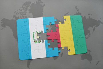 puzzle with the national flag of guatemala and guinea on a world map