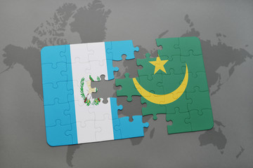 puzzle with the national flag of guatemala and mauritania on a world map