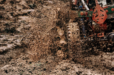 Scene of mud splash in off-road racing.Stop action with high speed shutter.