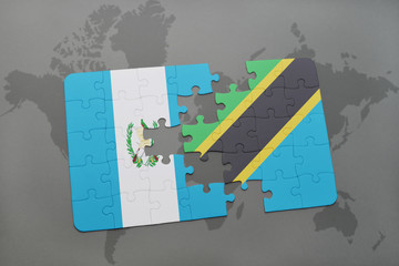 puzzle with the national flag of guatemala and tanzania on a world map