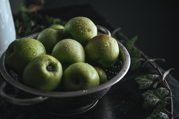 Organic fresh only gathered in the garden of juicy green apples.