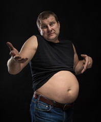 Brutal male actor with a big belly on a black background.
Caricature change.