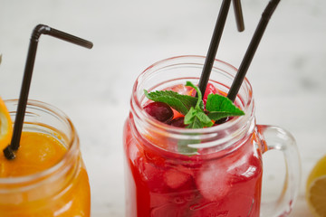 Fresh drink lemonade orange strawberry cranberries