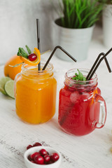 Fresh drink lemonade orange strawberry cranberries
